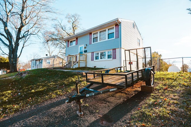 Photo - Cute and Bright split foyer with large fen... House