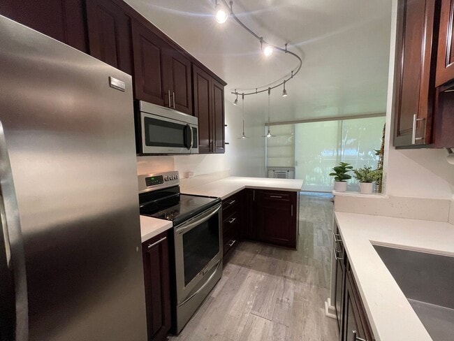Photo - Partly Furnished 2-bedroom, 2-bath condo a... Unit 206