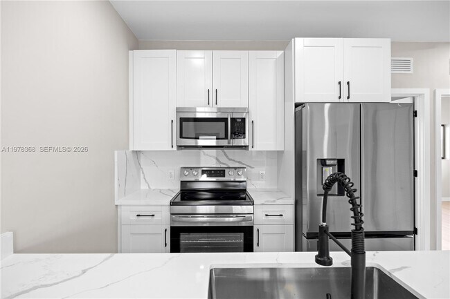 Photo - 630 NE 166th St Unit 3