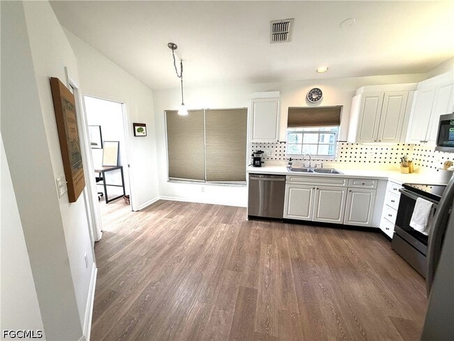 Building Photo - 3740 Fieldstone Blvd Unit 104