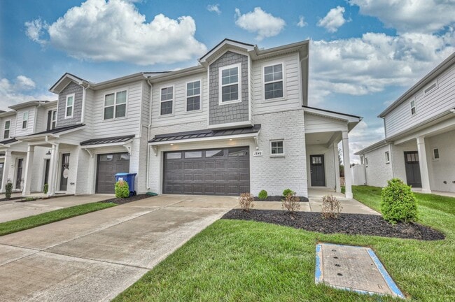 Building Photo - Brand New Luxury Townhome! 3 BR, 2.5 BA, 2 Car Garage, Pool, Dog Park, and More!