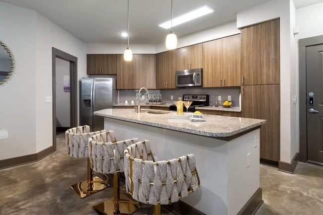 Building Photo - Work, Play & Relax with Top Amenities! Unit NATN