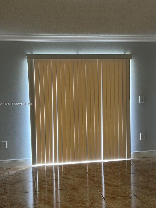 Photo - 1075 W 68th St Unit 218