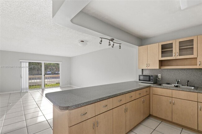 Building Photo - 7815 Camino Real Unit I101 Rental