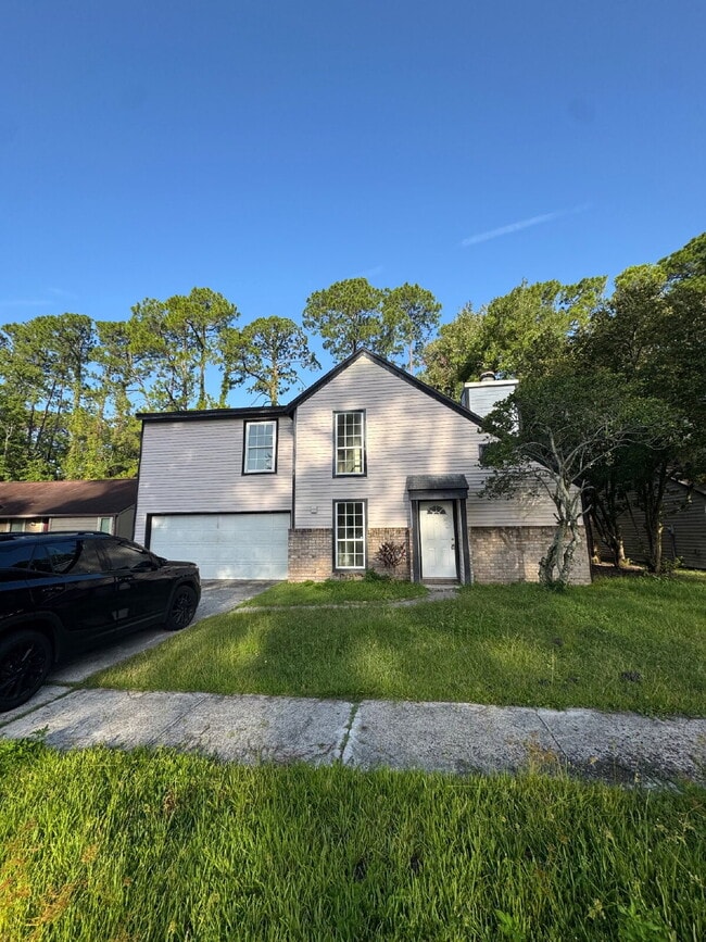 Building Photo - 4 bedroom 3 full bath home for rent in man...