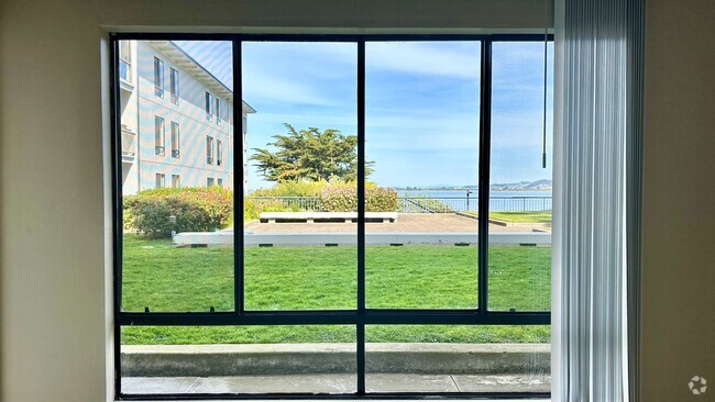 Building Photo - Water Views - Walk to the Water from your ... Unit 209 Rental