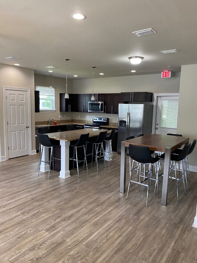 Photo - Now Leasing! Spacious 6-Bedroom, 6.5-Bathroom student house just minutes from campus. Only $725/m...