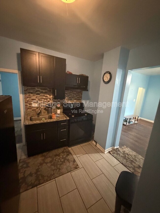 Photo - 8756 S Exchange Ave Unit 2f