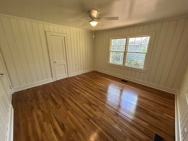 Photo - Hardwood floors and front porch