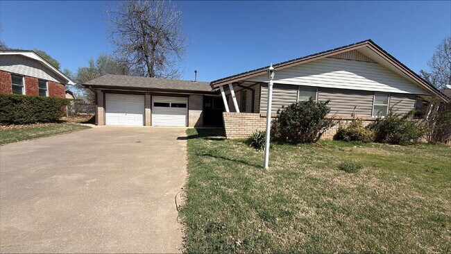 Photo - "Charming Space in Yukon, OK! Lawn care included!"