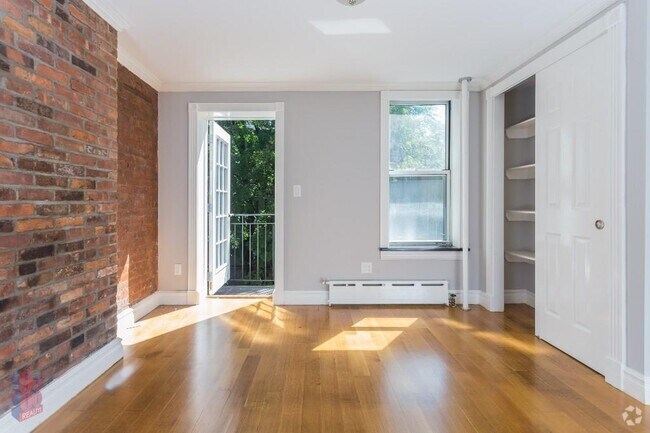 Building Photo - 118 E 7th St Unit 5W Rental