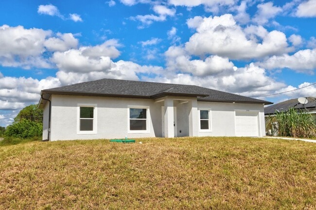 Photo - BRAND NEW 3B/2B/1 CAR GARGE-  SW LEHIGH ACRES