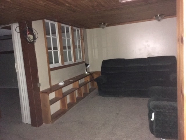 Living rm W/ book Cases , Couch & Recliner - 22 W Bloomingdale St Unit Basement Apt 22 W Bloomin