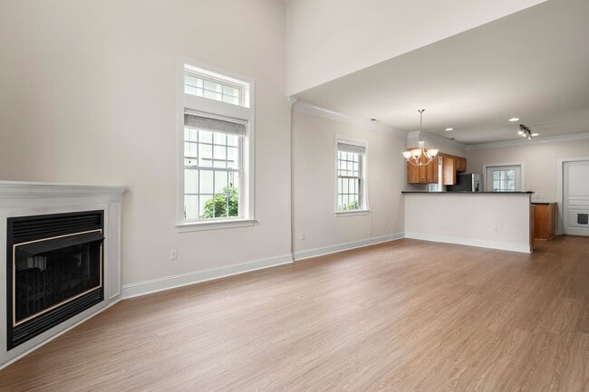 Photo - Five-Bedroom Tudor Home with Main-Level Primary Suite in Albemarle Reserve