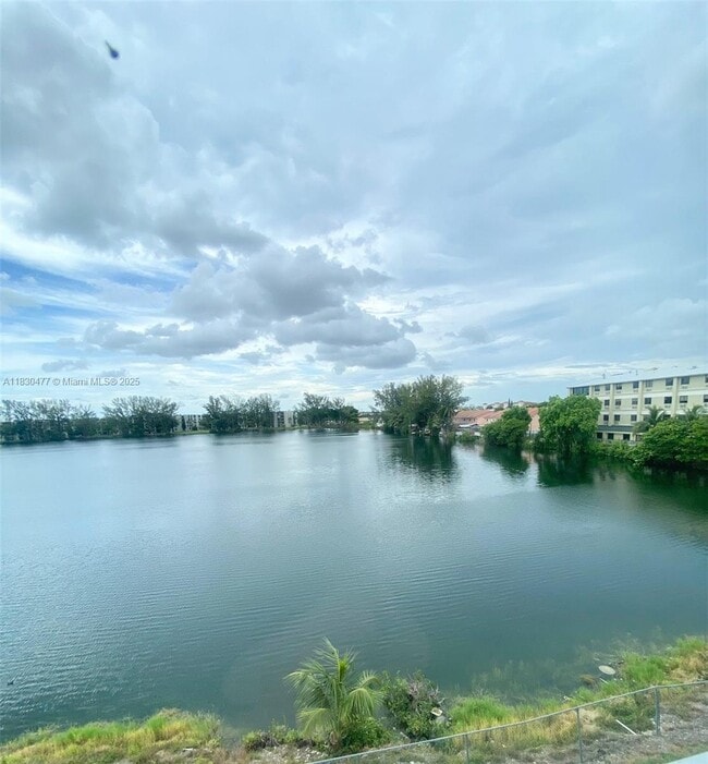 Photo - 9911 W Okeechobee Rd Condo Unit 1-402