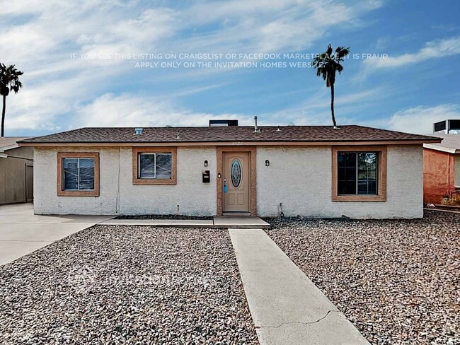 Building Photo - 8527 W Vale Dr