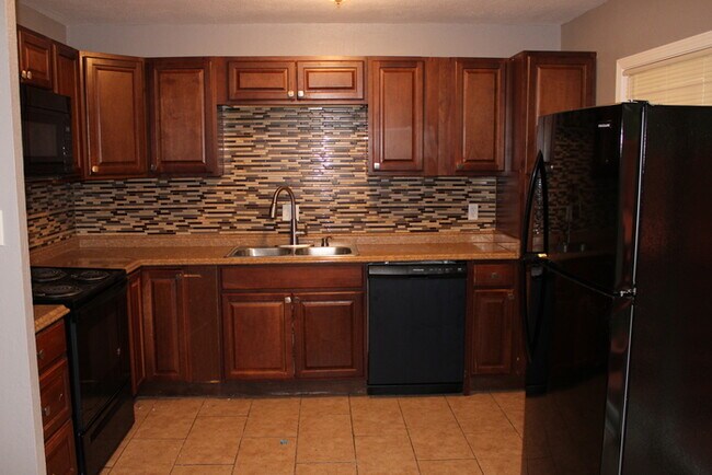 Photo - Spacious 4-bedroom, 1.5-bath home located ...