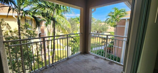 Building Photo - 6505 Emerald Dunes Dr Unit 307 PLUS GARAGE