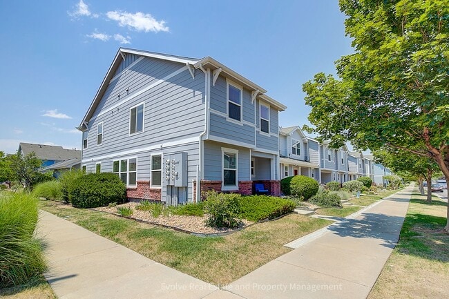 Photo - Evolve Real Estate: Beautiful Corner Townhome Available for Move-in on July 21st!
