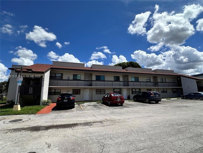 Building Photo - 8875 Fontainebleau Blvd Unit 205