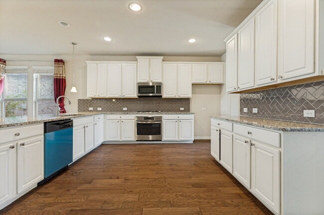 Photo - "Spacious 5-Bedroom Oasis with Granite Elegance and Hardwood Charm in Fort Worth!"