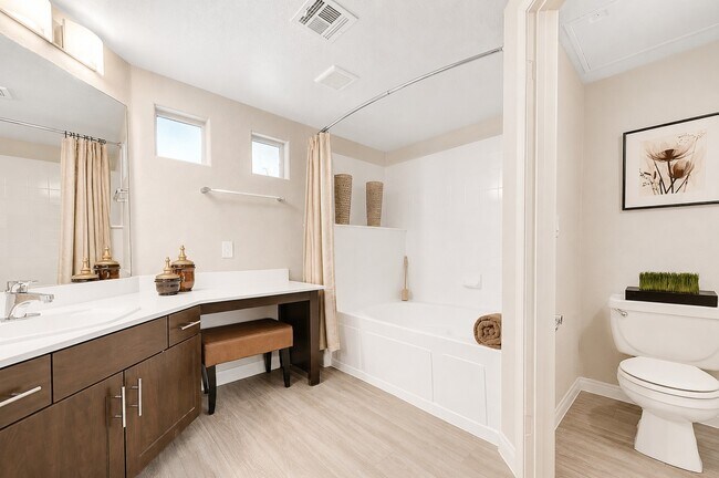 Elevate your lifestyle at Falling Water with this beautifully designed bathroom featuring modern finishes and ample natural light. Relax and unwind in a space that combines comfort and style. Schedule your visit today to see it in person!