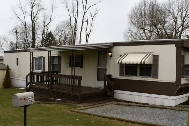 Building Photo - Charming Mobile Home with Utility Shed