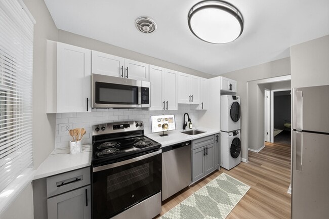 Modern living awaits at Eagle Rock Apartments at Bel Air. This stylish kitchen features sleek stainless steel appliances, ample counter space, and a cozy layout perfect for culinary adventures. Explore your new home today!
