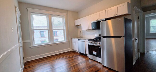 Building Photo - 901 N Leavitt St Unit 901 - 3
