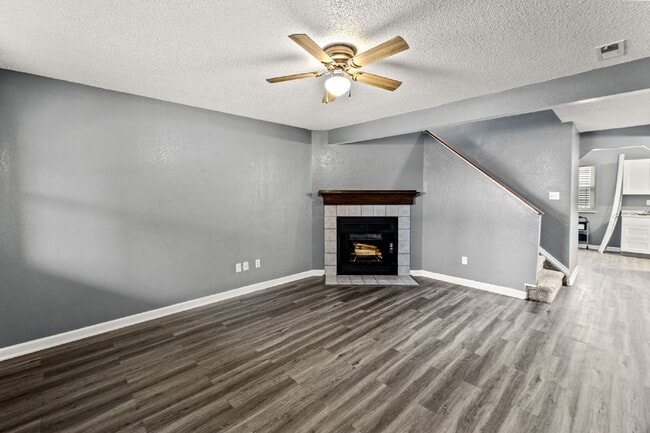 Photo - Charming Two-Story Home with Fenced Yard & Cozy Fireplace — Pet-Friendly!