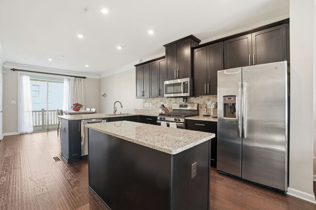 Photo - Stunning 3BR Townhome with Roof Deck in Reserves at Dakota Crossing!