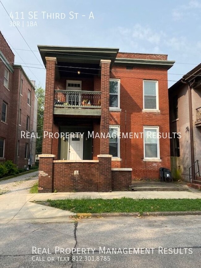 Building Photo - 411 SE Third St-A Unit A