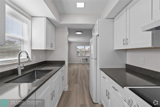 Building Photo - 1150 E Sample Rd Unit 202 Rental