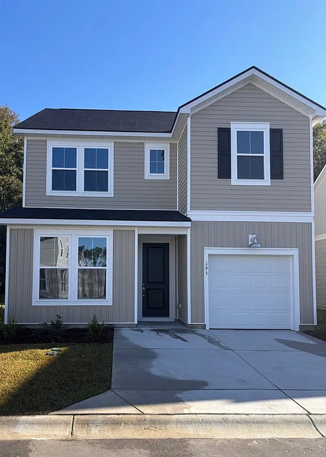 Building Photo - 4BR SFR • Open Layout • Patio • Garage Parking - 29566