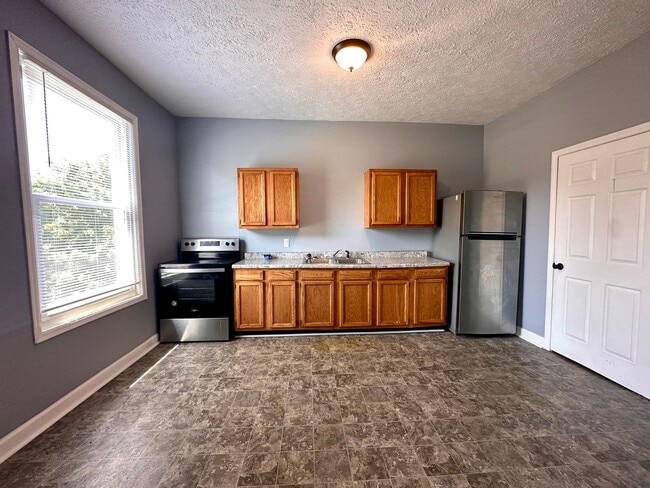 Photo - Step into charm, comfort, and convenience in the heart of Historic Farrington’s Grove!