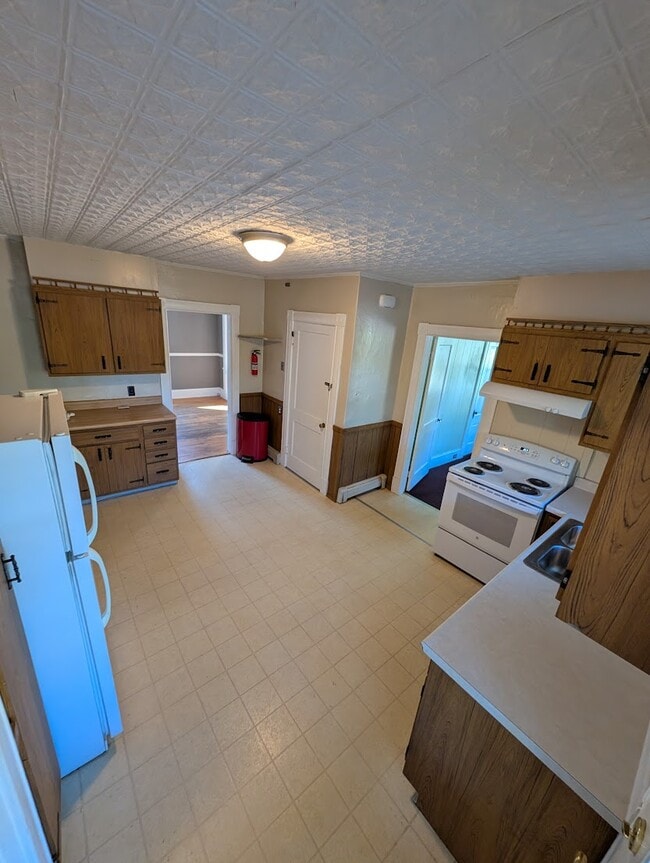 Kitchen from front door - 54 Highland St Unit 54 Highland