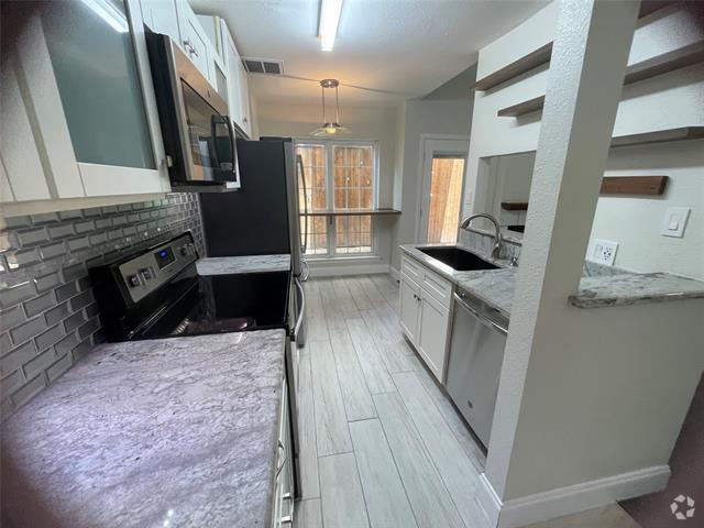 Building Photo - 3904 Rawlins St Unit 113 Rental