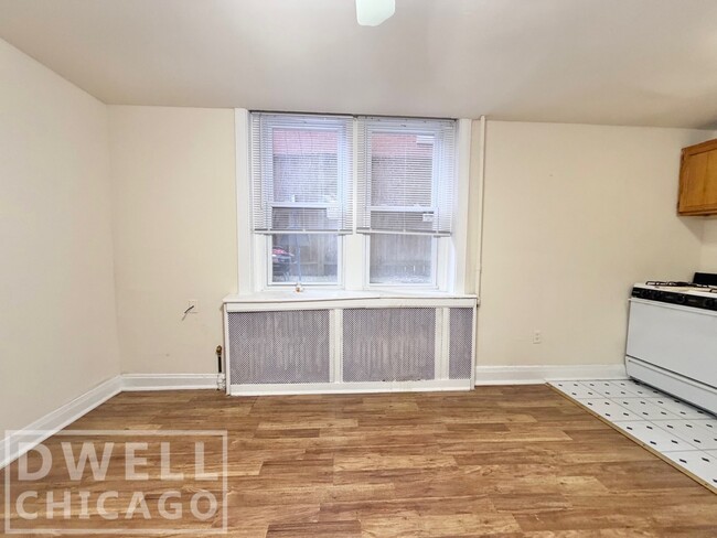 Building Photo - 6912 N Lakewood Ave Unit 1