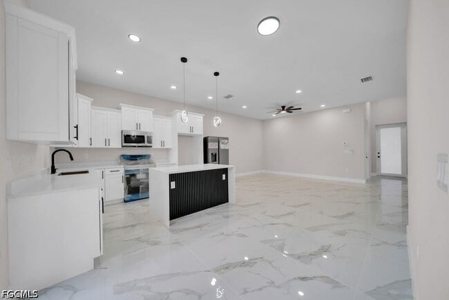 4648-4650-4650 Leonard Blvd S