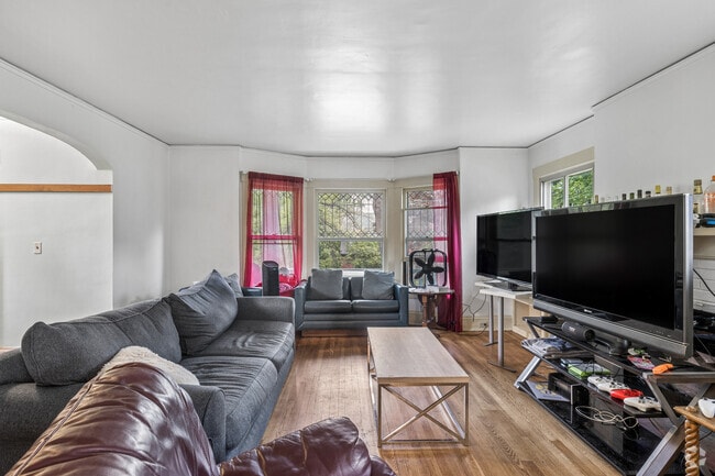 4BR, 1.5BA - 1,900SF - Living Room - West Shore Apartments - 105