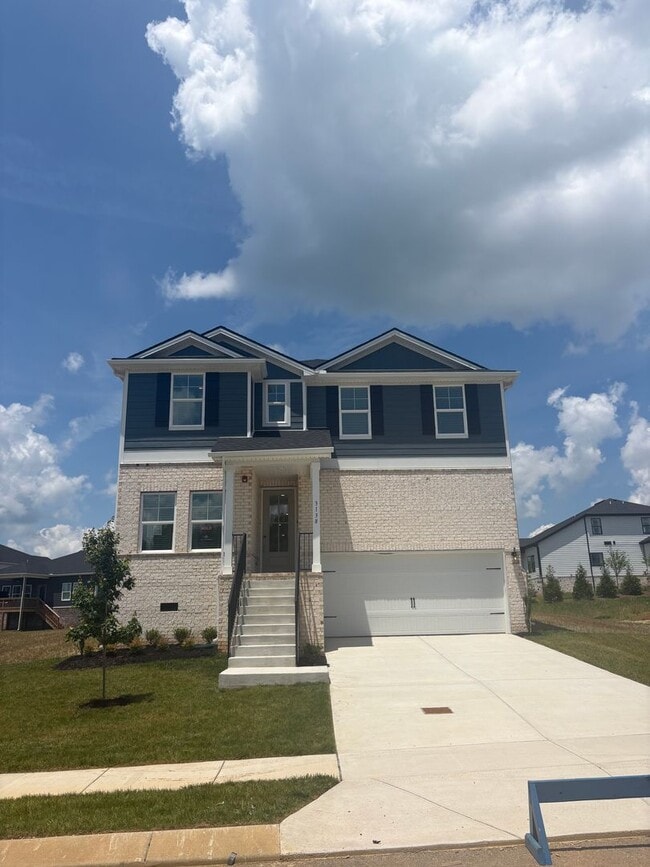Photo - New Construction | Covered Deck + Open Living | Columbia, TN