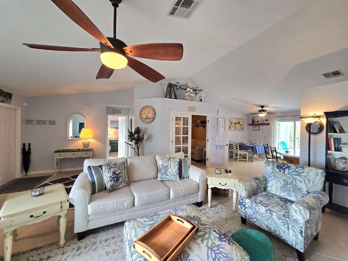 Photo - 2507 Embers Pkwy W, Cape ~ Beautiful 3 bed PLUS DEN Pool Home ~ Fully Furnished! LEASING SPECIAL!!