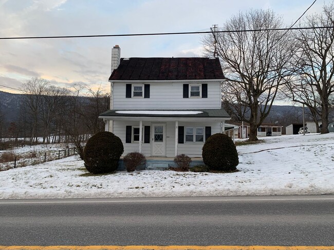 Building Photo - Multi-level 3-bedroom, 1-bath single-family home