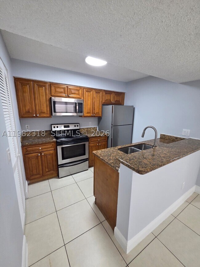 Building Photo - 1241 SW 46th Ave Unit 1006