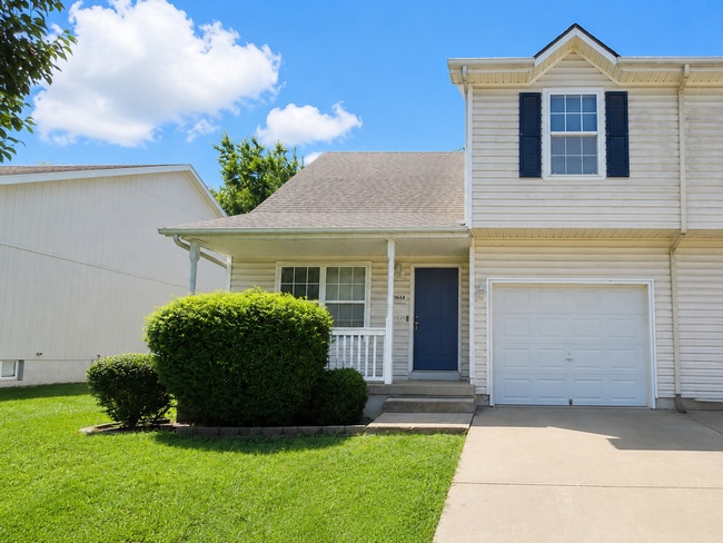 Building Photo - 3 Bed, 1.5 Bath Duplex with Garage and Extra Storage Space!