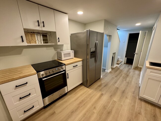 Kitchen - 1217 W 37th St Unidad Brand new cozy apartment