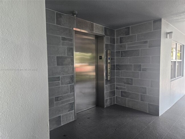 Photo - 1201 SW 128th Terrace Unit 305-E