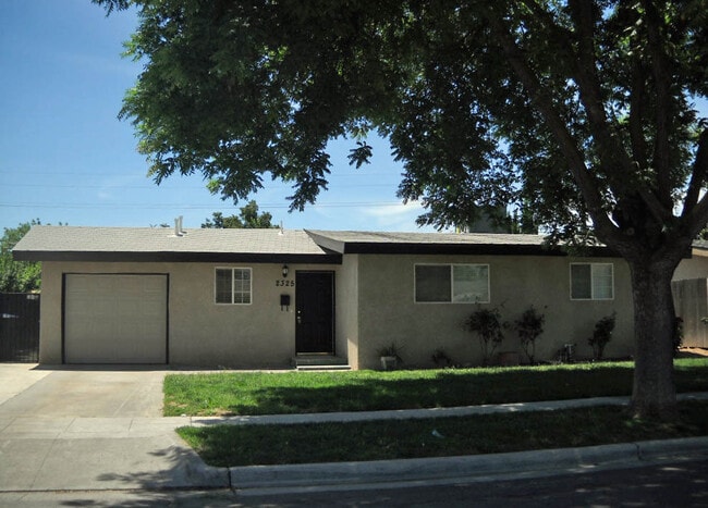Building Photo - Remodeled and updated home offering nice amenities.