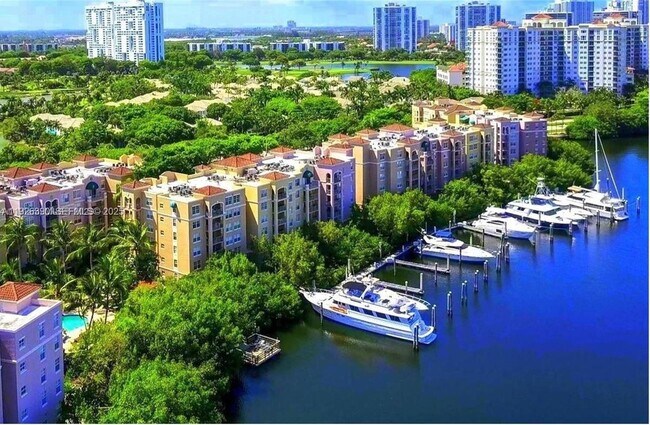 Building Photo - 19655 E Country Club Dr Unit 6107