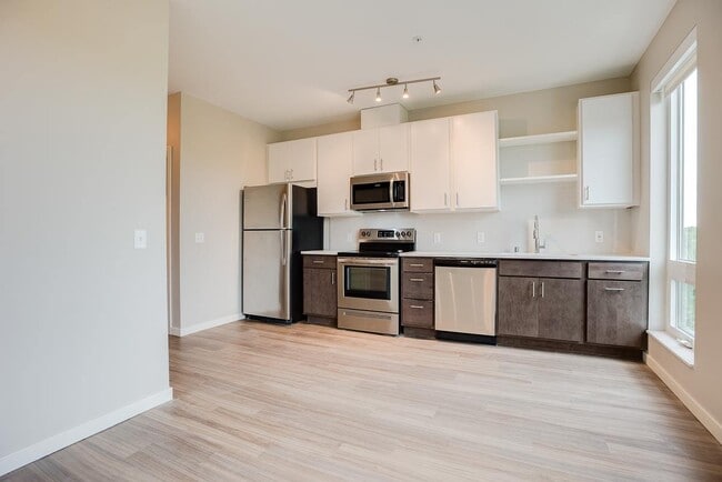 Our open-concept living spaces are designed for modern living, with high-end finishes and thoughtful details.